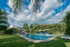 Отель Hotel Boutique Casa Bella  Хьютепек